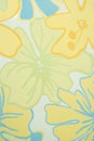 Tile with a pattern of white-yellow-green flowers Royalty Free Stock Photo