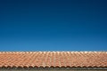 Tile Roof and Bright Blue Sky Royalty Free Stock Photo