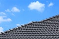 Tile roof on a new house with blue sky Royalty Free Stock Photo