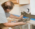 Tile Setter Applying Mortar