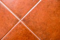 Tile texture background, ceramic orange. Detail image cropped from the floor. Abstract image background. Royalty Free Stock Photo