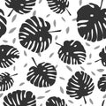 Tile tropical vector pattern with black exotic leaves on white background Royalty Free Stock Photo