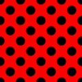 Tile vector pattern with black polka dots on red background Royalty Free Stock Photo