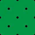 Tile vector pattern with black polka dots on green background Royalty Free Stock Photo