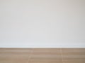 Tile wood floor pattern floor with white cement wall background Royalty Free Stock Photo