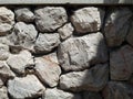 Tileable Stone wall texture seamless in half dark shadow Royalty Free Stock Photo