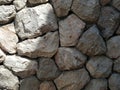 Tileable Stone wall texture seamless in half dark shadow