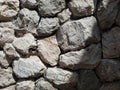 Tileable Stone wall texture seamless in half dark shadow Royalty Free Stock Photo