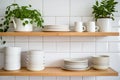 Tiled background and shelves with dishes. Different tableware backdrop. Dishes in cupboard in kitchen. Kitchenware. Kitchen