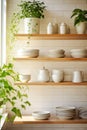 Tiled background and shelves with dishes. Different tableware backdrop. Dishes in cupboard in kitchen. Kitchenware. Kitchen