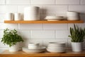 Tiled background and shelves with dishes. Different tableware backdrop. Dishes in cupboard in kitchen. Kitchenware. Kitchen