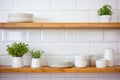 Tiled background and shelves with dishes. Different tableware backdrop. Dishes in cupboard in kitchen. Kitchenware. Kitchen