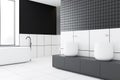 Tiled bathroom corner with sink and tub Royalty Free Stock Photo