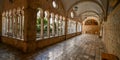 Tiled floor and arch stone wall inside Franciscan Church and Monastery in Dubrovnik, Croatia Royalty Free Stock Photo