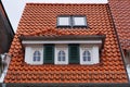 Tiled mansard roof of medieval building in Bremen, Germany. Royalty Free Stock Photo