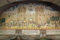 Tiled mosaic drinking fountains depicting the city walls and life in Barcelona, Spain