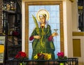 Tiled panel featuring St Lucy in Fuengirola on the Costa del Sol in Spain