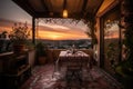 a tiled patio with view of the sunset, set for a romantic al fresco dinner Royalty Free Stock Photo