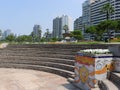 Tiled pot and exterior buildings in a park of Lima