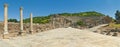 Tiled road to ancient amphitheater with columns Royalty Free Stock Photo