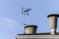 tiled roof chimneys antenna old equipment technology