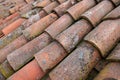 tiled roof supported on a double pitch roof, the old tiles tend to slip over time, because they are not fixed. Royalty Free Stock Photo