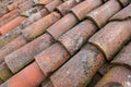 tiled roof supported on a double pitch roof, the old tiles tend to slip over time, because they are not fixed. Royalty Free Stock Photo