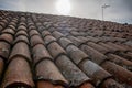 tiled roof supported on a double pitch roof, the old tiles tend to slip over time, because they are not fixed. Royalty Free Stock Photo