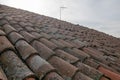 tiled roof supported on a double pitch roof, the old tiles tend to slip over time, because they are not fixed. Royalty Free Stock Photo