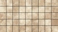 Tiled textured background with uniform square ceramic pattern, providing a neutral beige and brown surface for design elements, Royalty Free Stock Photo
