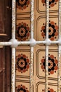 Tiled window with rusty iron lattice