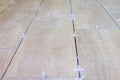 Tiler use plastic tile spacers for accurate alignment of floor tiles. Royalty Free Stock Photo