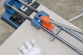 Tiler using a tile cutter