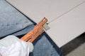 Tiler using a tile nipper