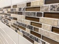 Mosaic tiles made of glass and stone, newly installed on the wall as decoration or kitchen backsplash Royalty Free Stock Photo