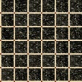 Tiles made of natural polished stone. Mosaic made of marble and granite Royalty Free Stock Photo