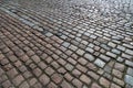 Tiles texture. Pattern of ancient german cobblestone in city downtown. Little granite paving stones. Antique gray pavements Royalty Free Stock Photo