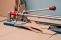 Tiling, tile trimming, metering and cutting. Repair of the floor Royalty Free Stock Photo