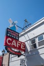 The Dutch Mill Diner Cafe, a burger restaurant with a vintage neon sign in the downtown area