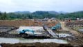 Tilt shift photo about blue excavator Royalty Free Stock Photo