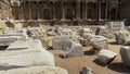 Tilt up shot of ruins or remains of columns at Devlet Agorasi in Side, Turkey. 4K footage, Beautiful old archeological park