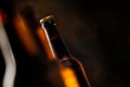 Tilted angle view of a glowing beer bottle Royalty Free Stock Photo