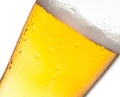 Tilted glass of fresh beer and drops on white Royalty Free Stock Photo