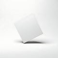 A tilted light gray square floating against a plain white background Royalty Free Stock Photo