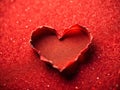 A Tilted Perspective on Love Unveiling a Miniature Heart Crafted from Torn Red Paper with a Stunning TiltShift