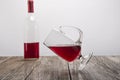 Tilted red wine glass Royalty Free Stock Photo