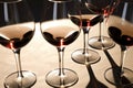 tilted view of wine glasses casting shadows