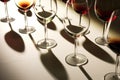 tilted view of wine glasses casting shadows