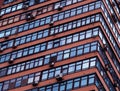 Tilted windows of many-storied building architecture backdrop