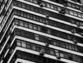 Tilted windows of many-storied building architecture backdrop